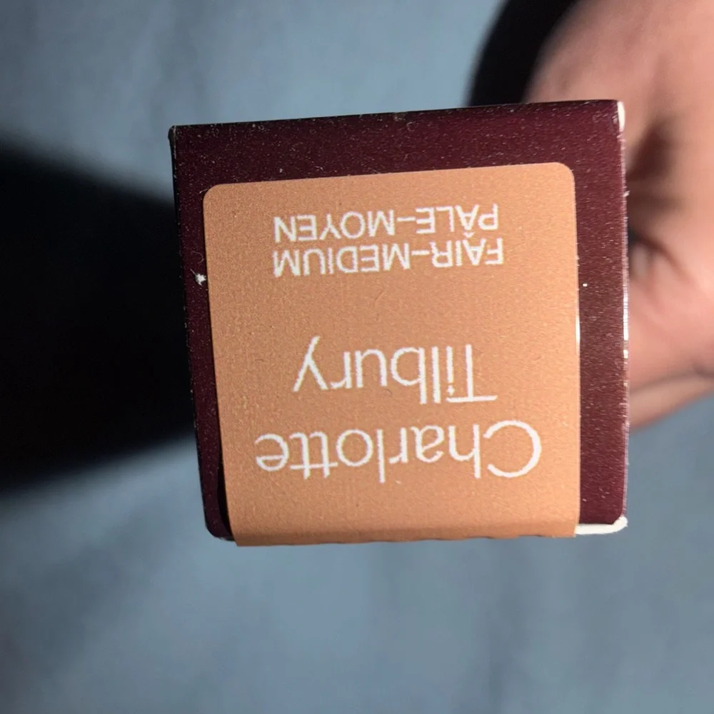 Charlotte Tilbury Fair-Medium Pale-Moven Box with Deep Burgundy Accents
